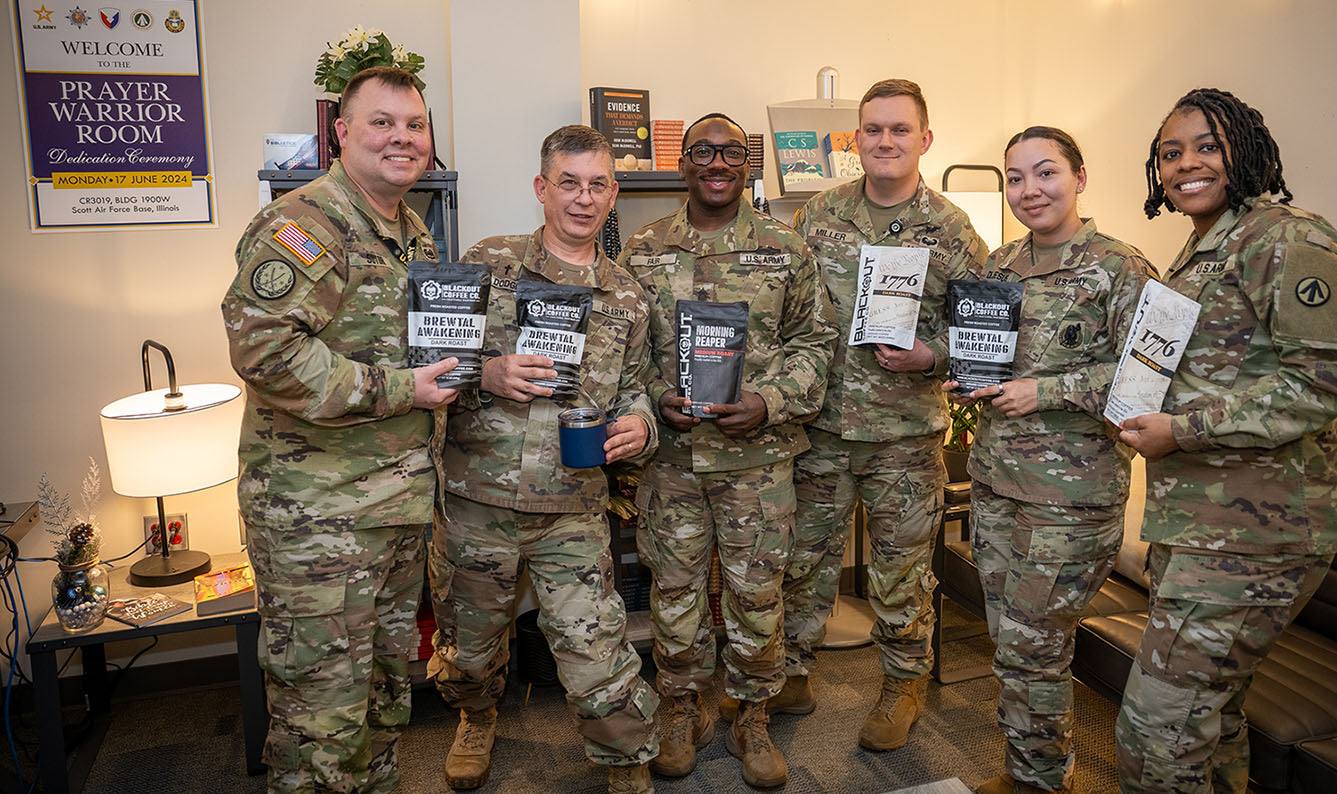 Deployed service members drinking coffee