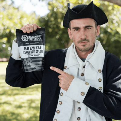 brewtal awakening man holding the coffee bags