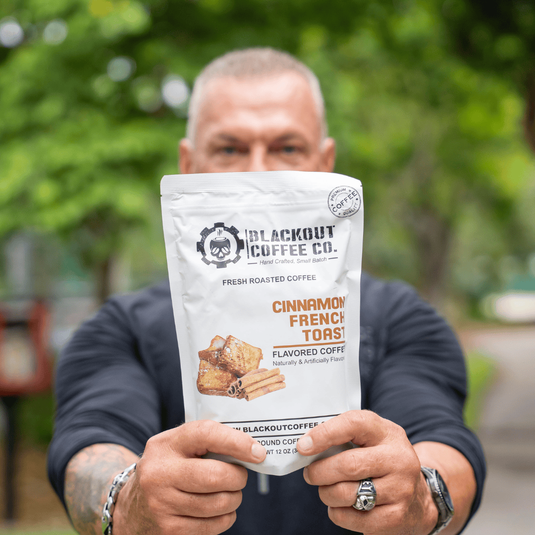 cinnamon french toast man holding the coffee bag