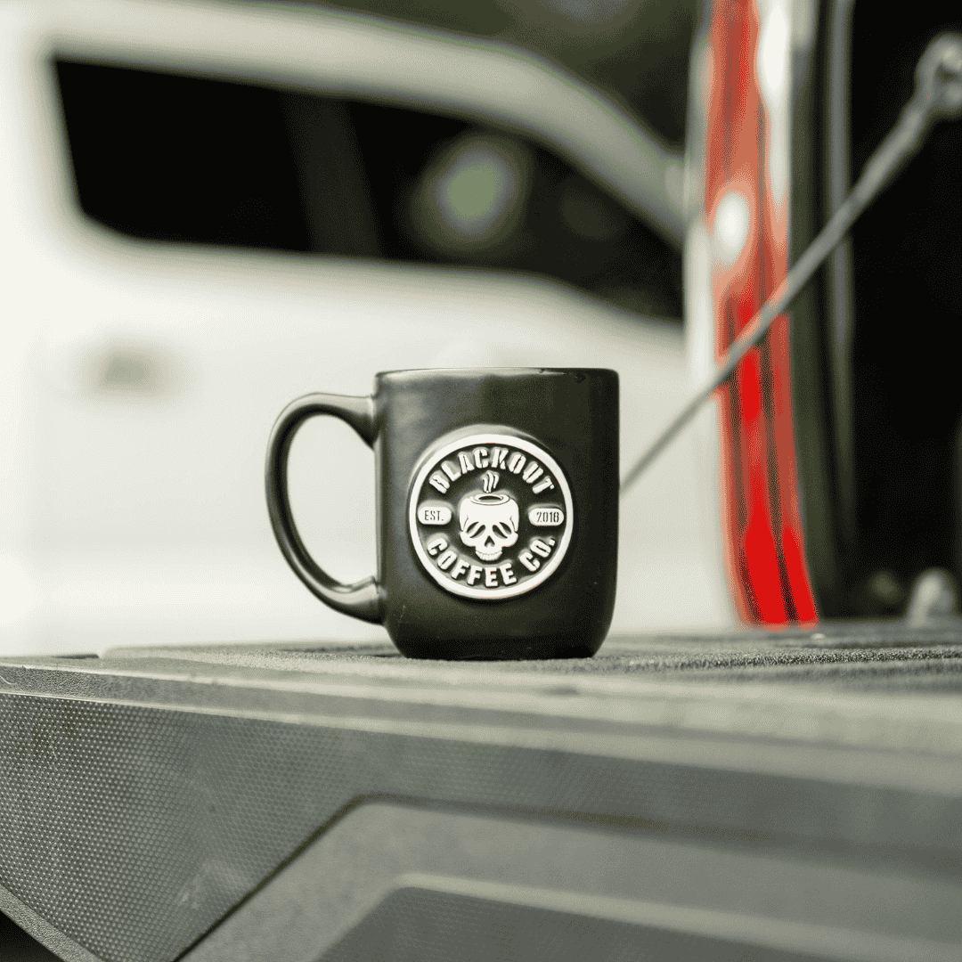 coffee mug on the back of the truck